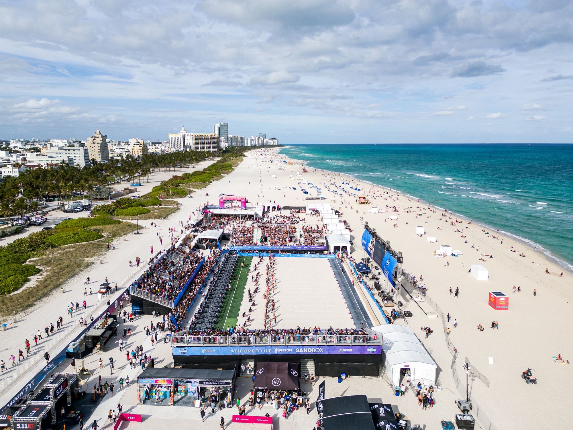 Drone view of the beach arena on Miami Beach, ocean on one side and hotels on the other